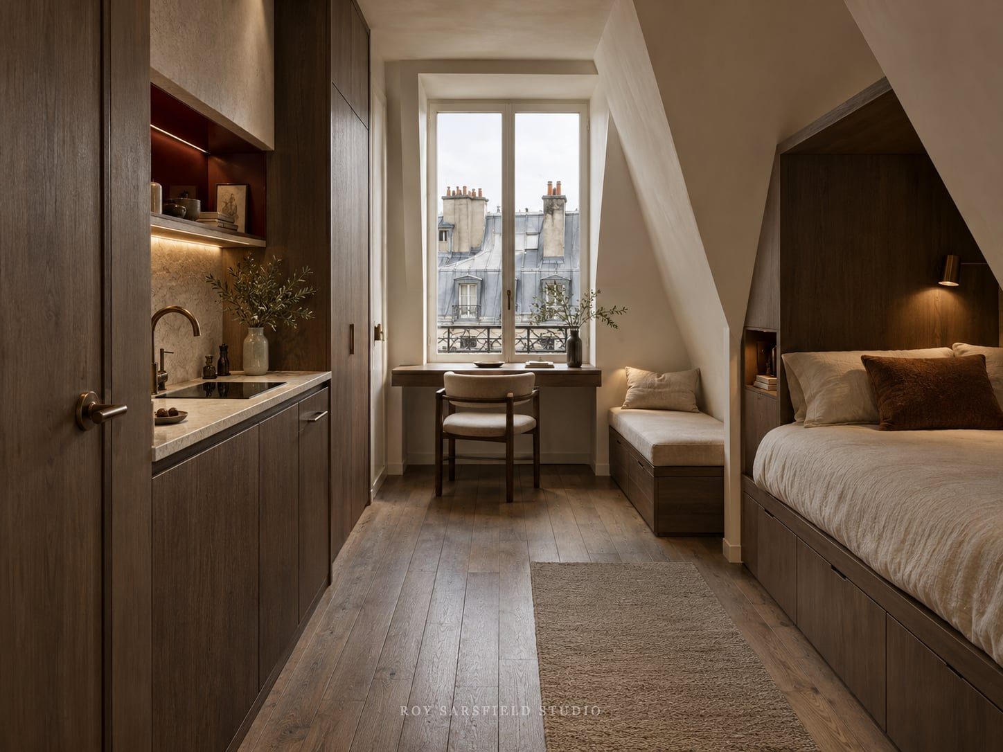 Chambre de bonne parisienne après transformation, vue sur les toits